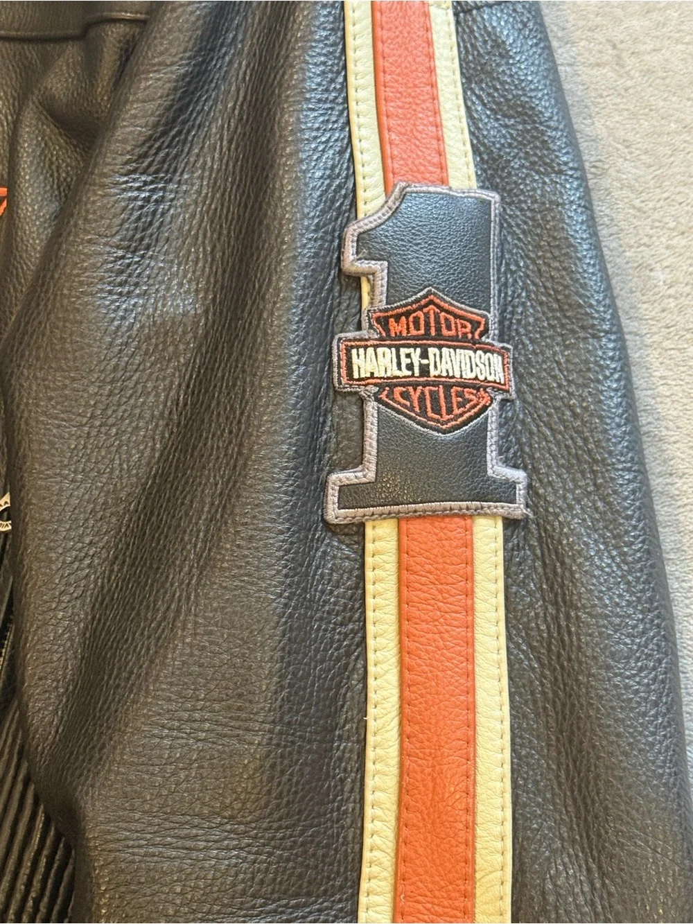 Harley-Davidson Black Leather Jacket with Orange and Cream Racing Stripes